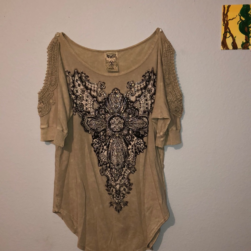 First picture is the front, and the second is the back of the shirt:)
